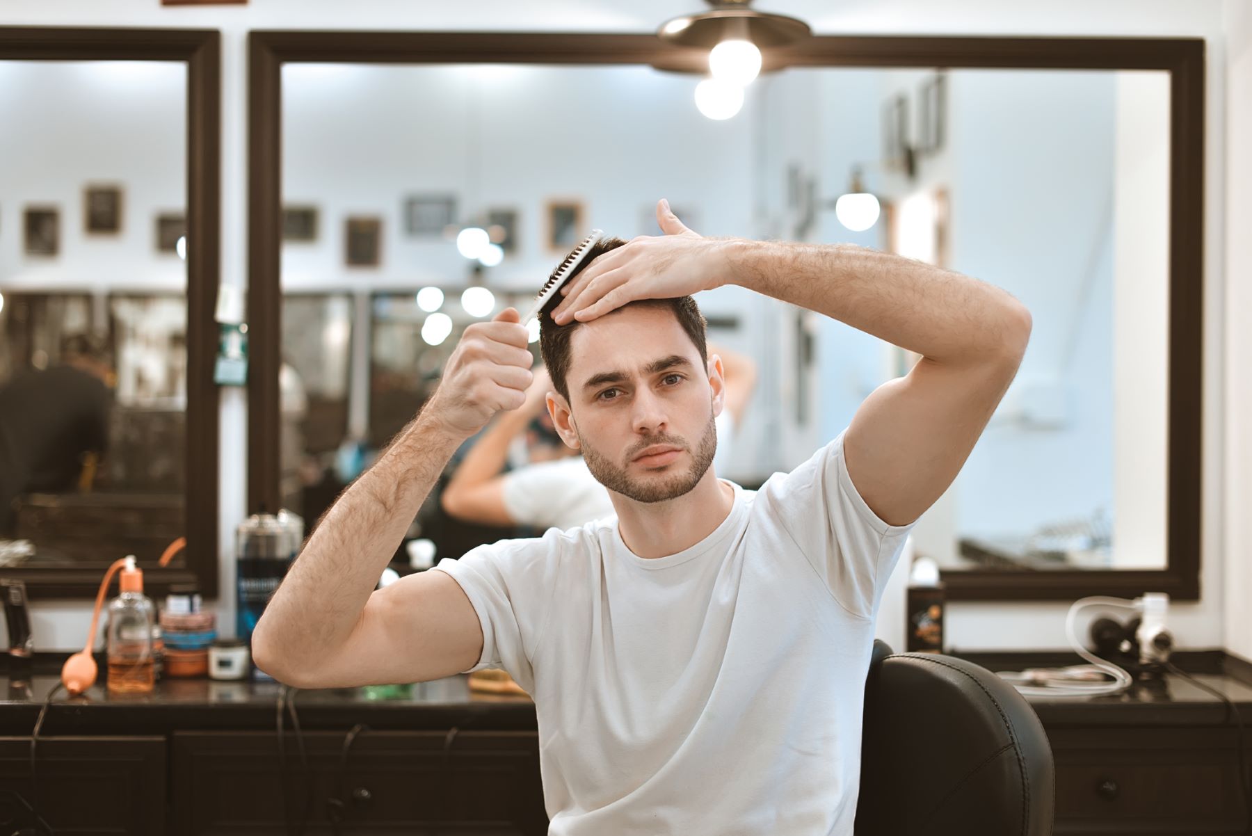 Man styling his hair