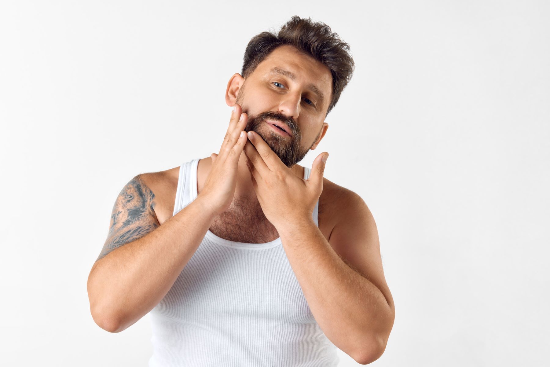 Man using rosemary oil for beard growth