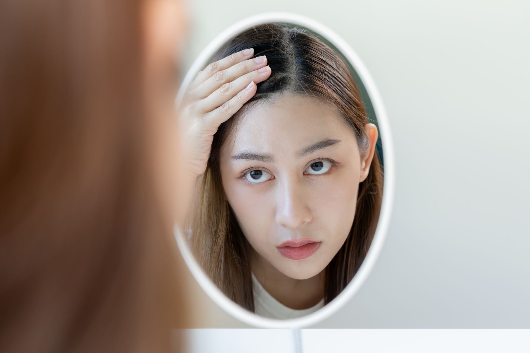 Woman worried her dry scalp may cause hair loss