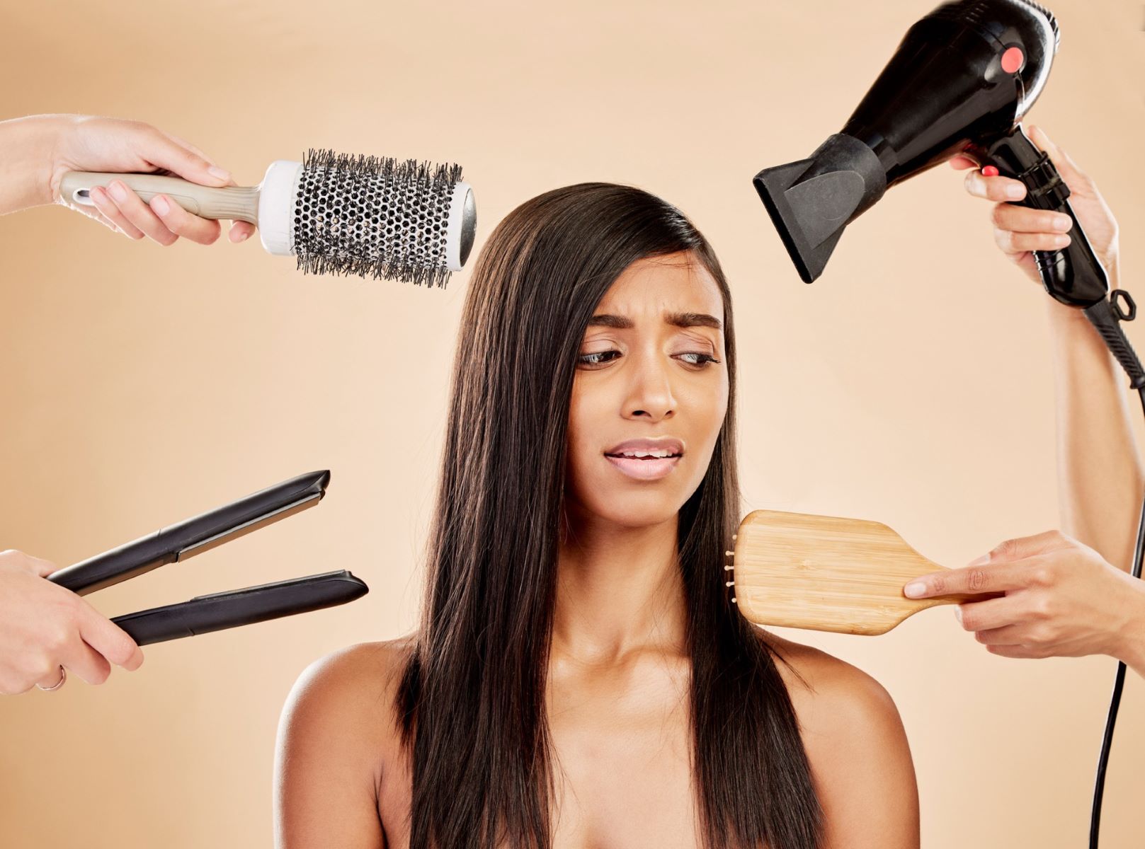 woman's hair being succumbed to various treatments