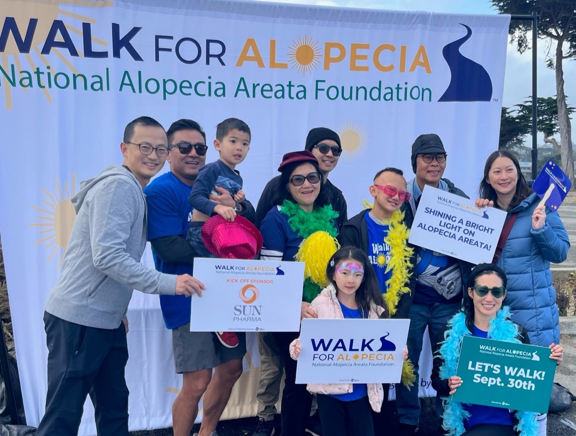 people at an alopecia awareness event