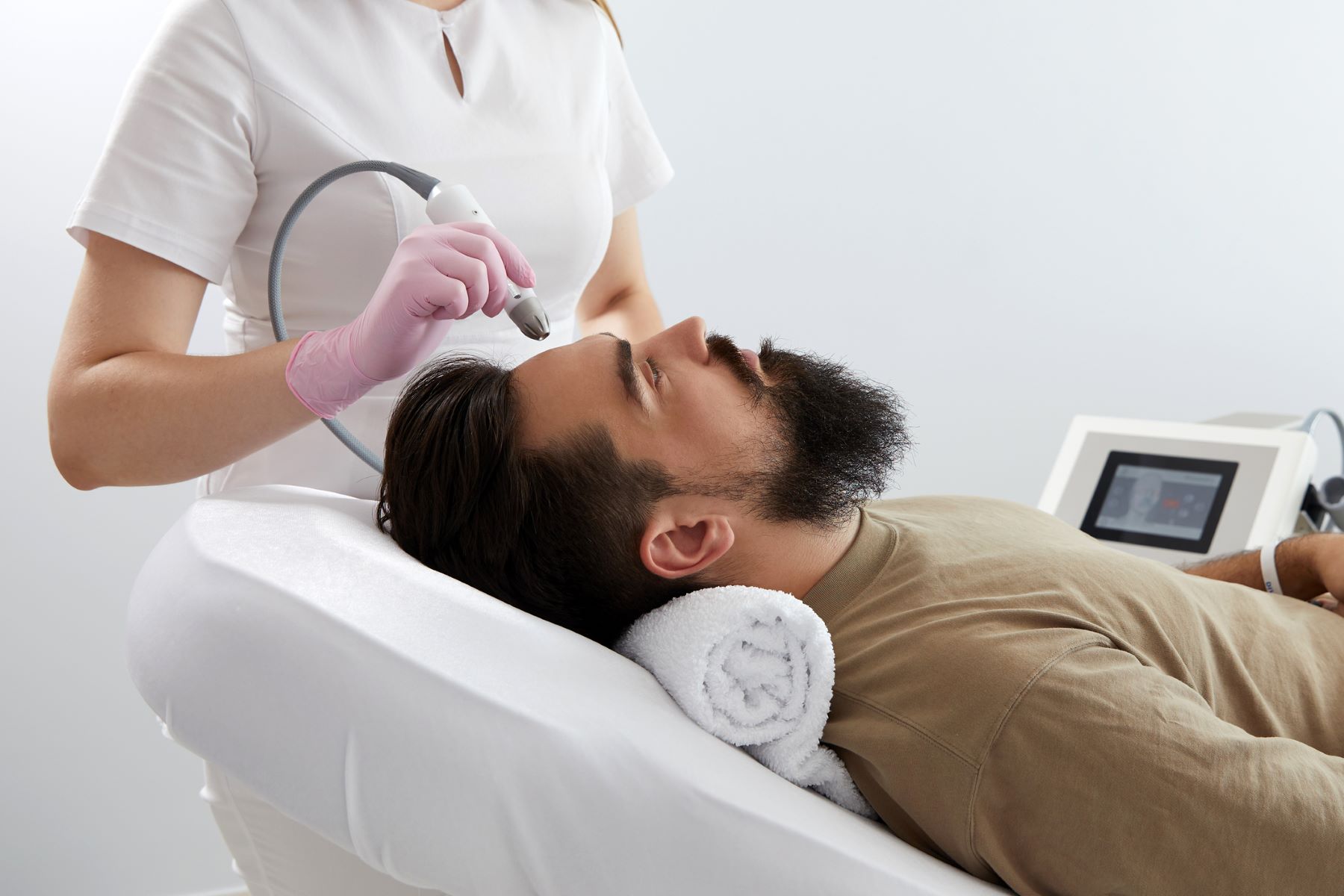 Hair doctor improving a patient’s hair growth