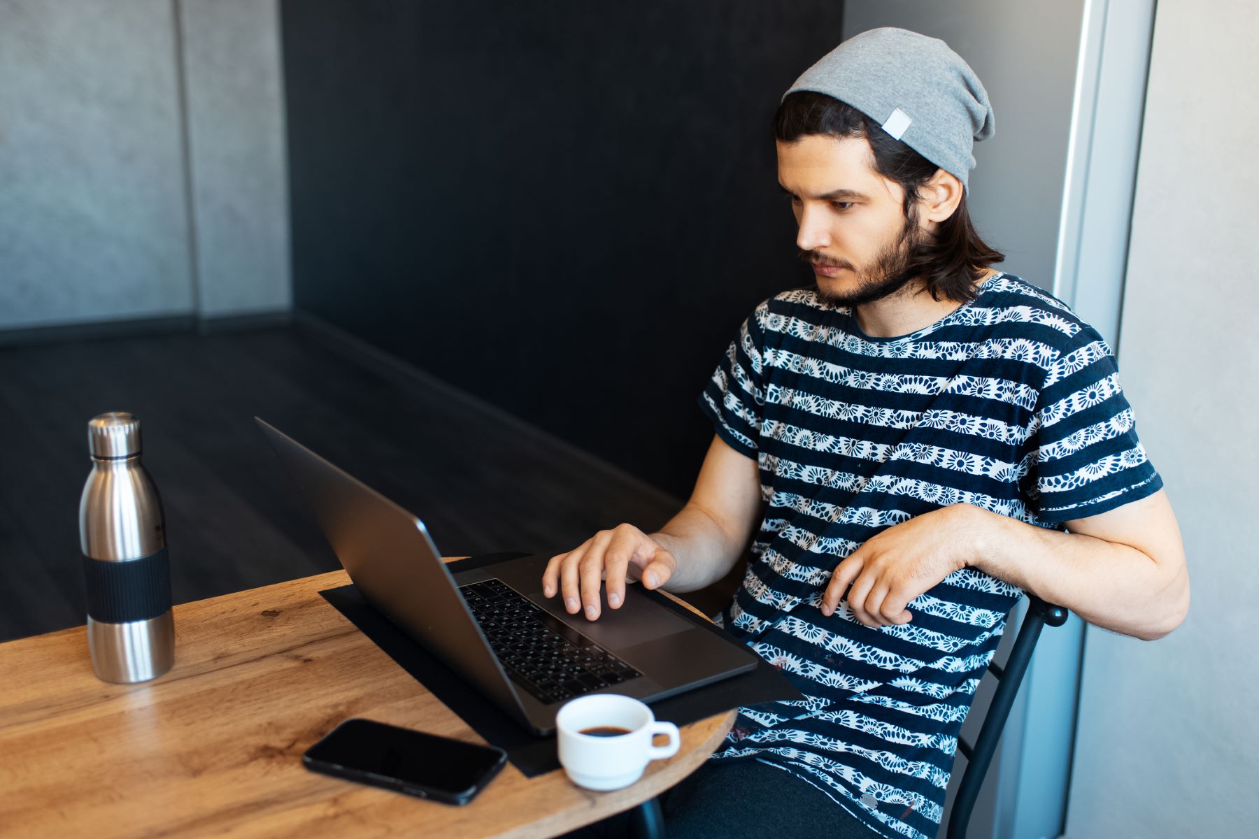 Man wearing a beanie on top of his head