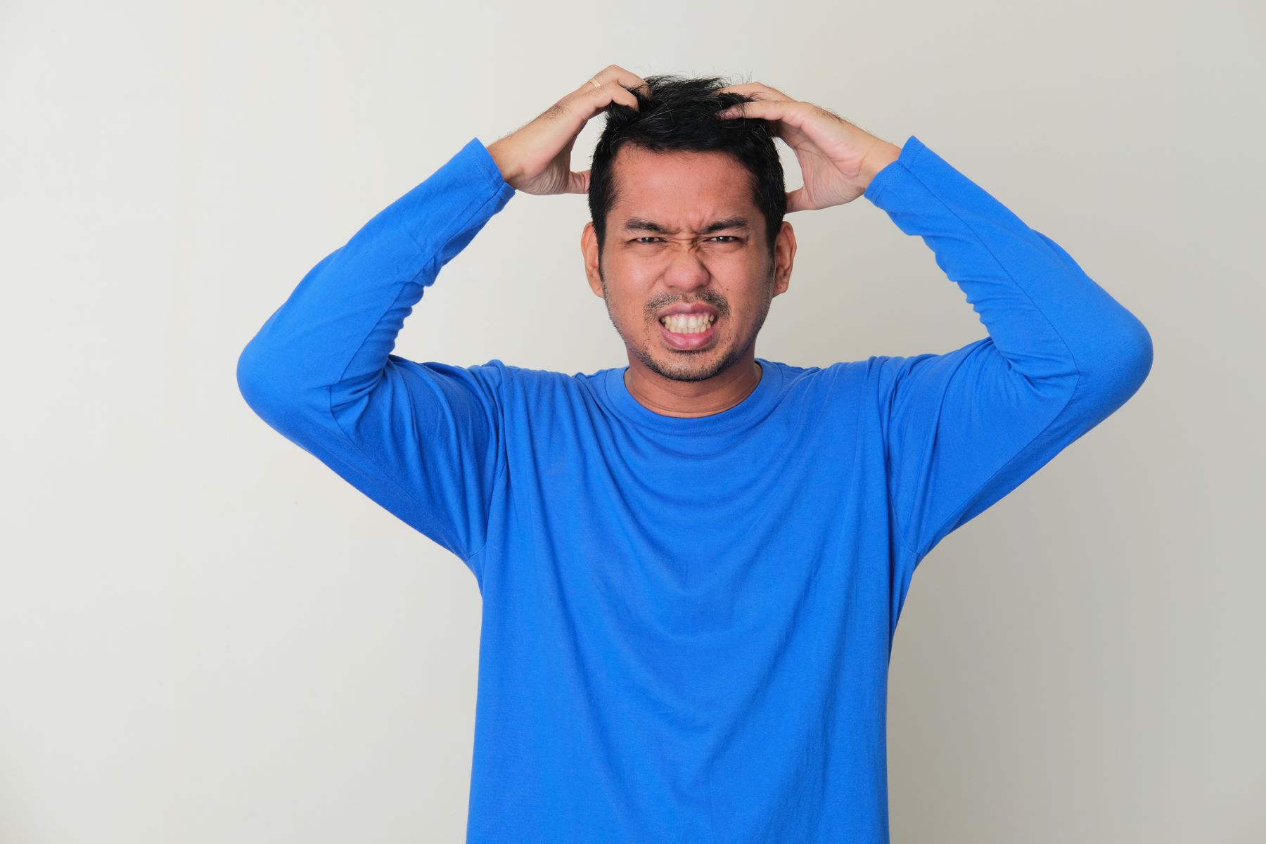 Man with dirty scalp and itchy hair