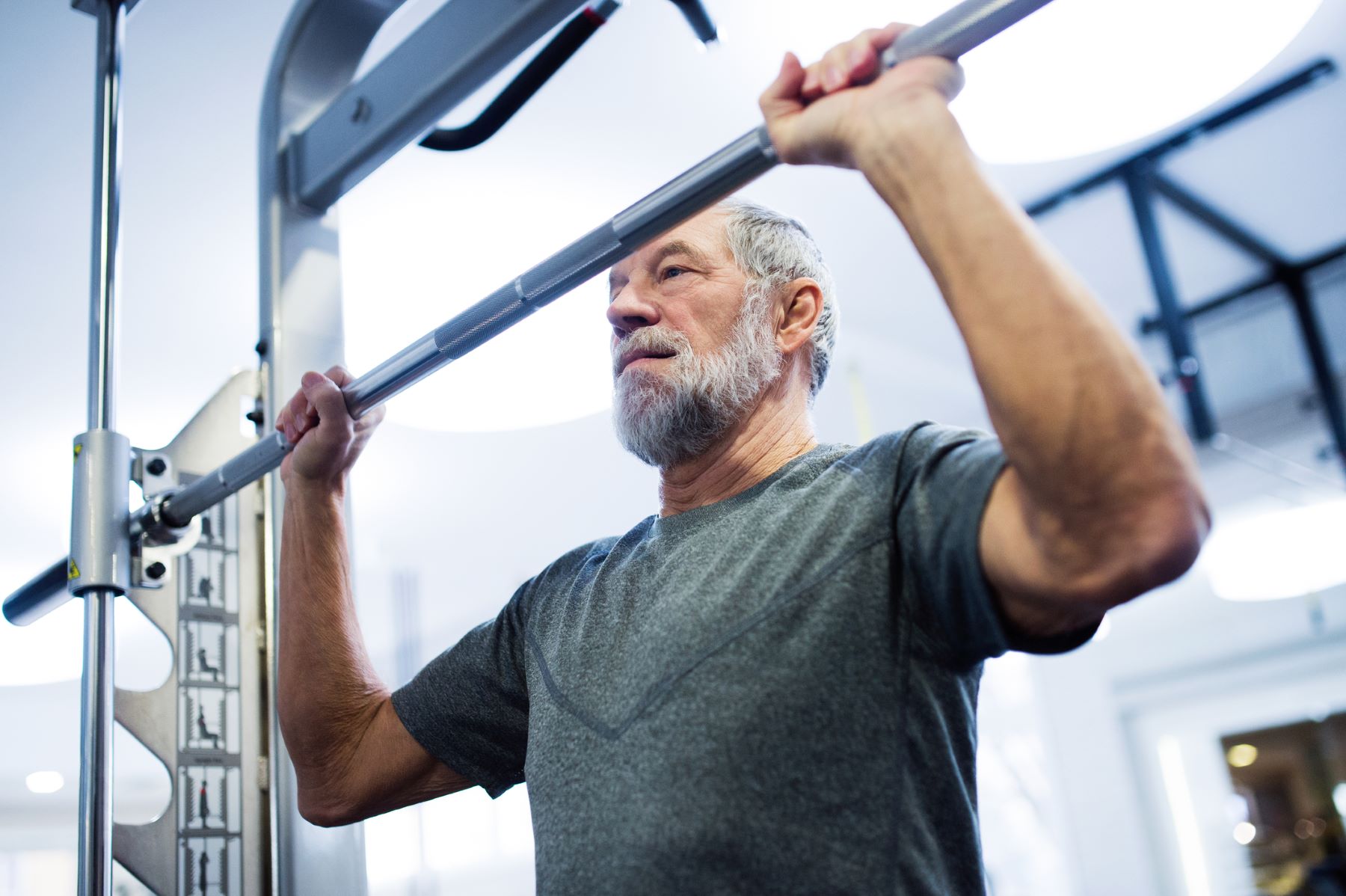 Senior man working out in the gym