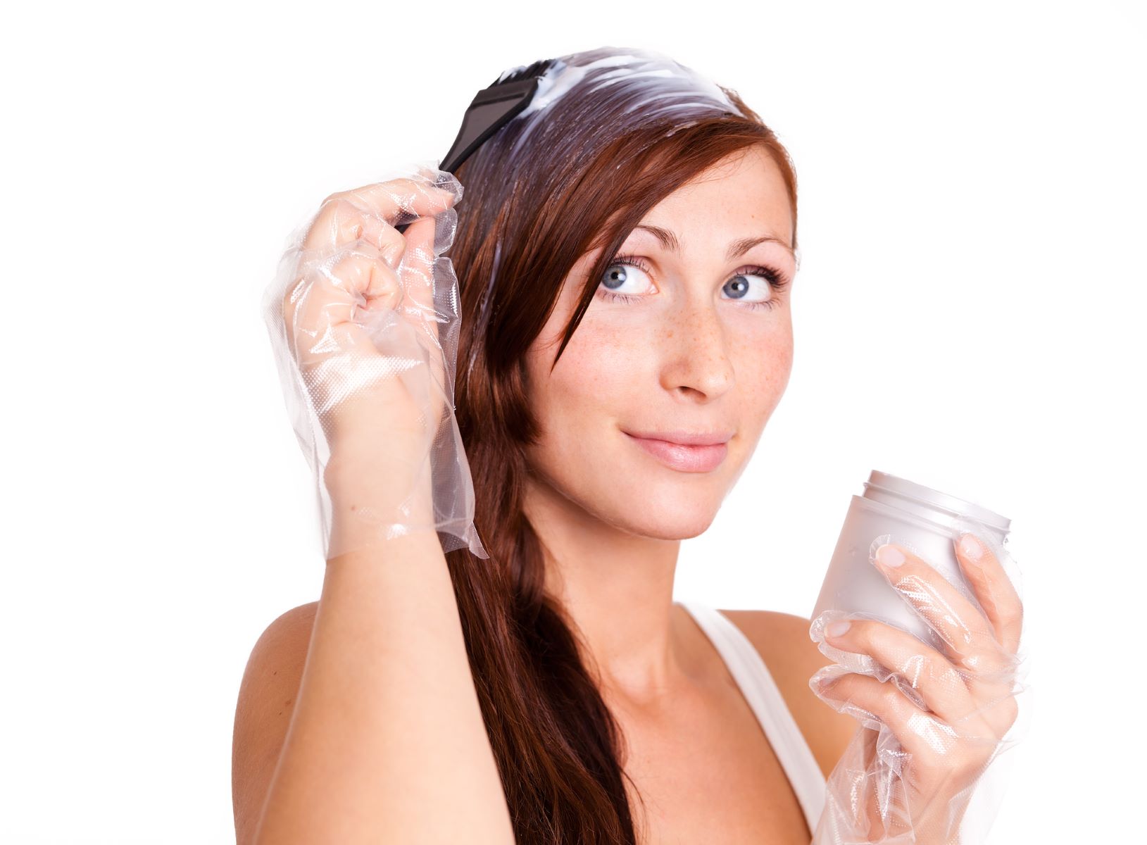 Woman applying semi-permanent hair dye