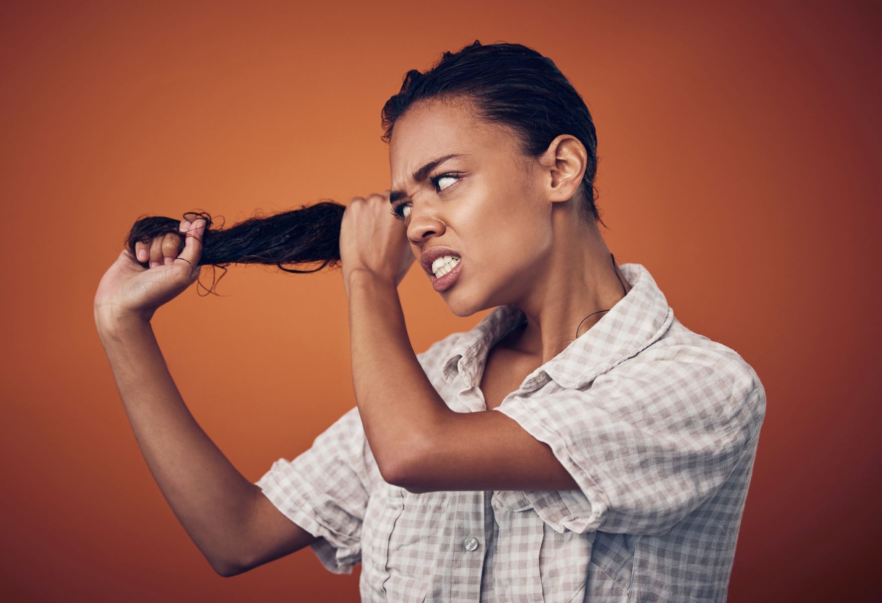 Woman with dry and brittle hair