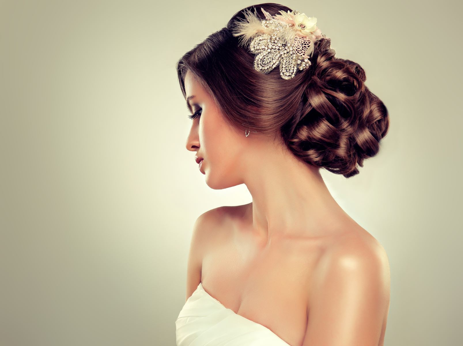 Bride wearing a curly low bun