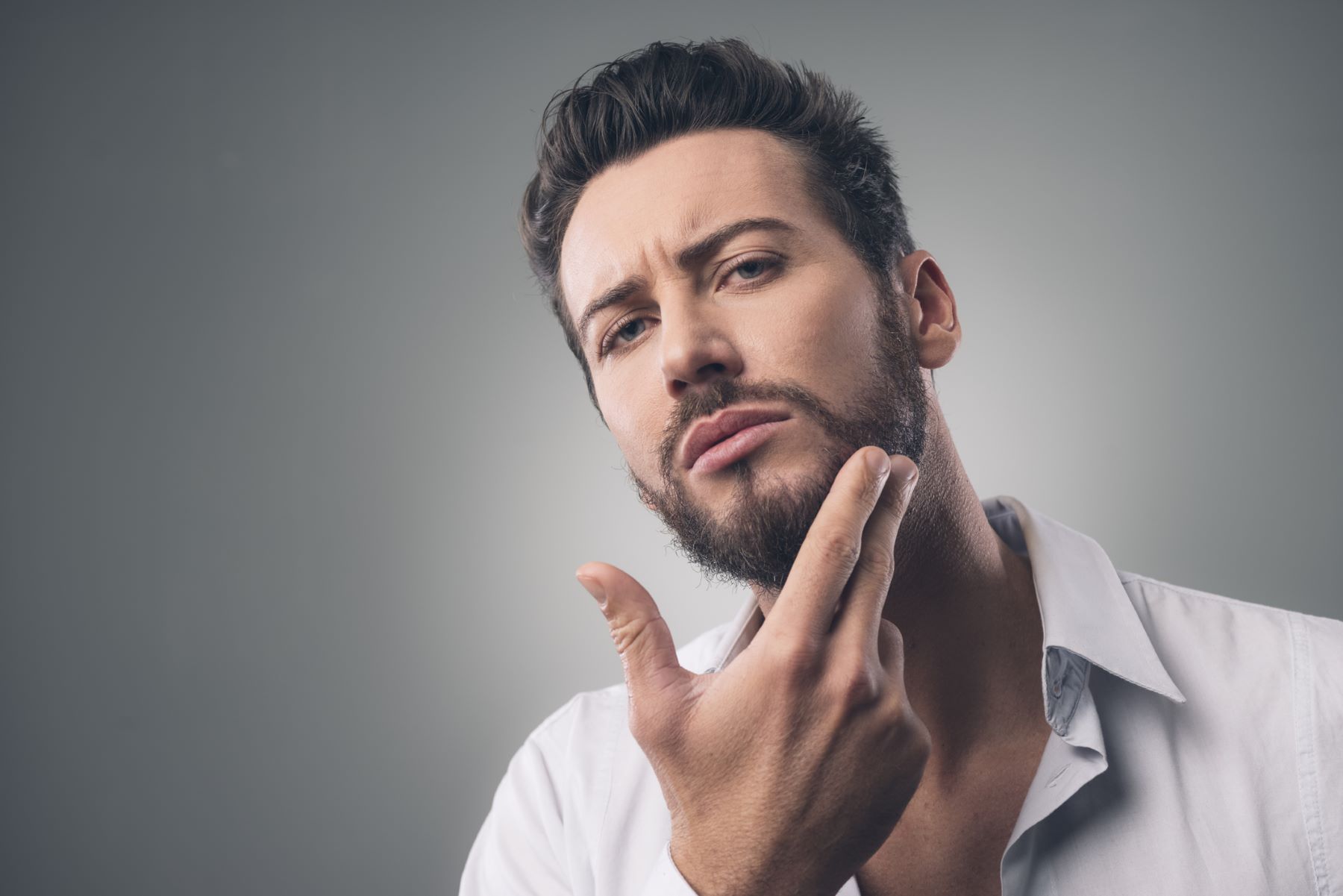 Man checking beard hair loss from fungus