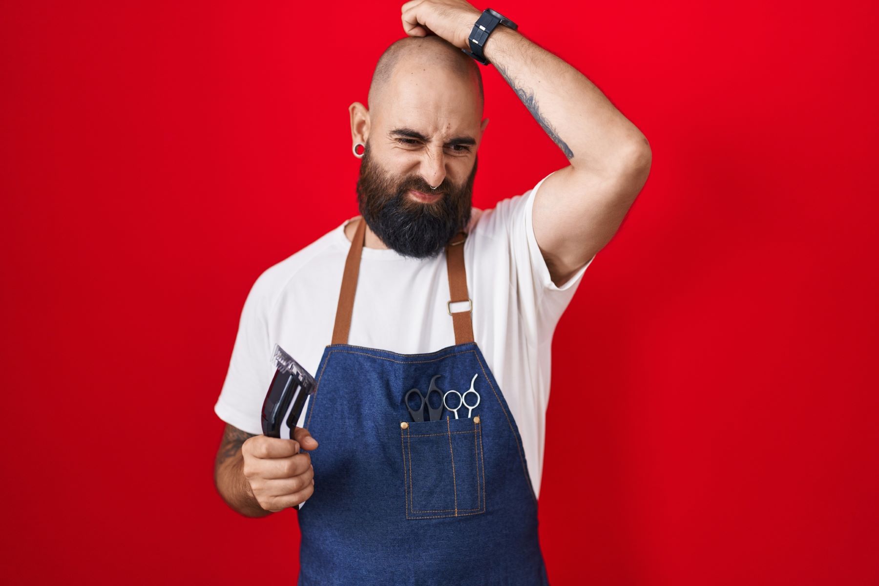 Man in doubt about shaving his head