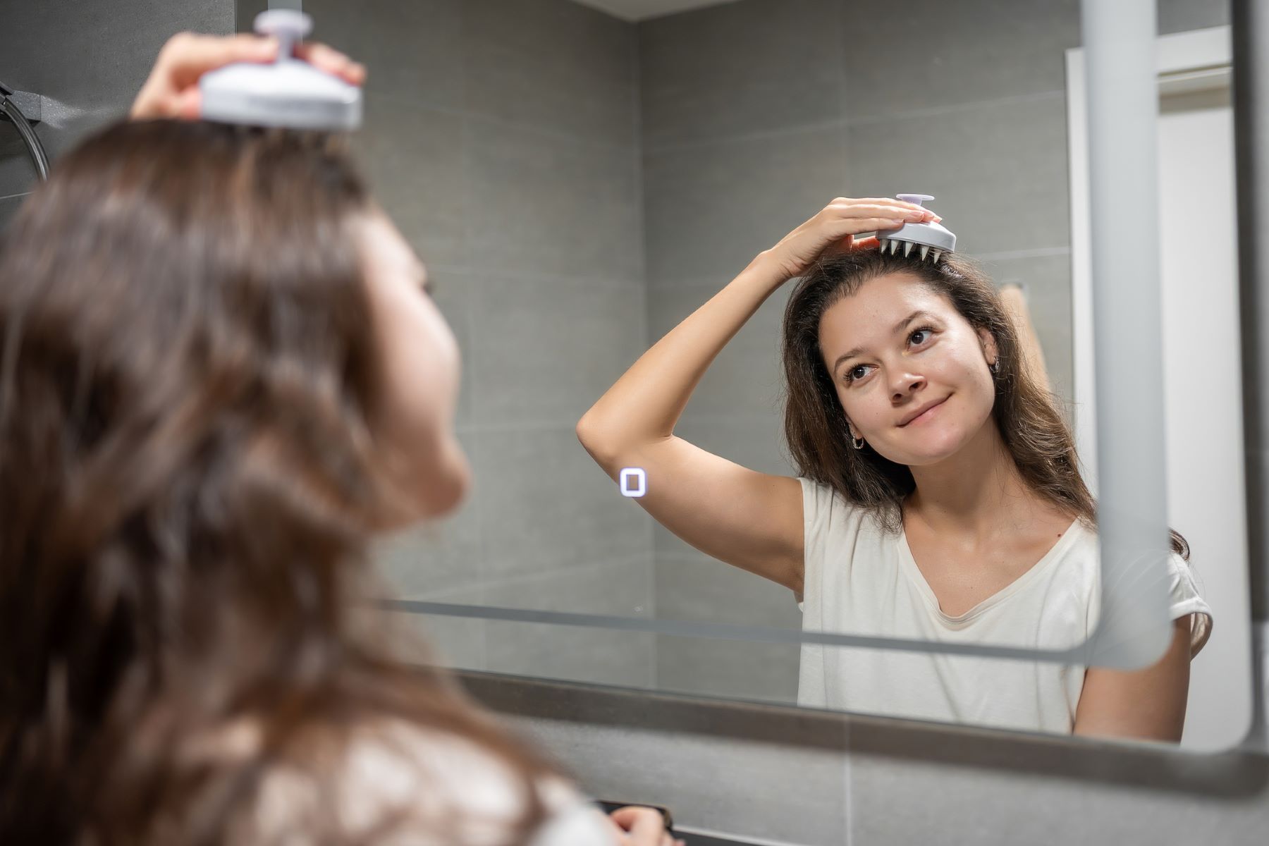 Woman enjoying a relaxing scalp massage