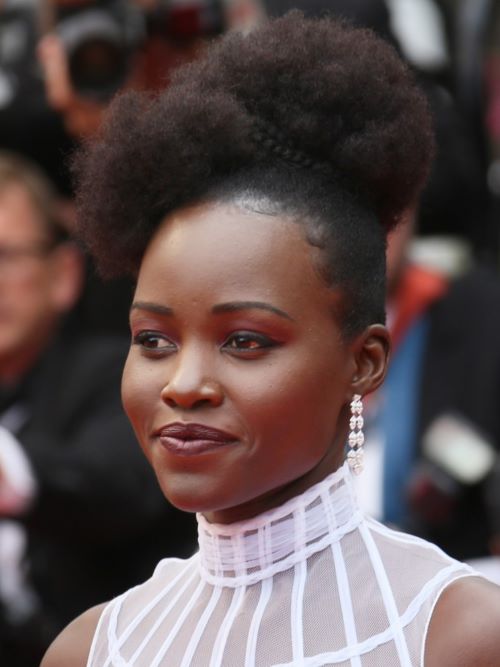 Lupita Nyong'o illustrating type 4C hair