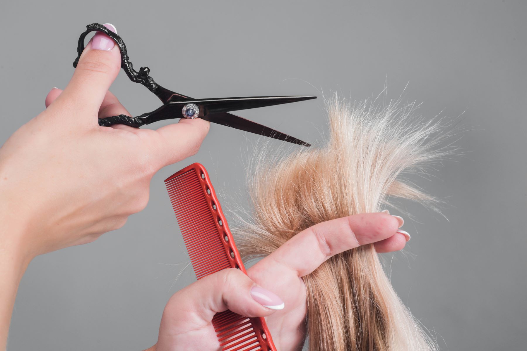 Stylist trimming split ends