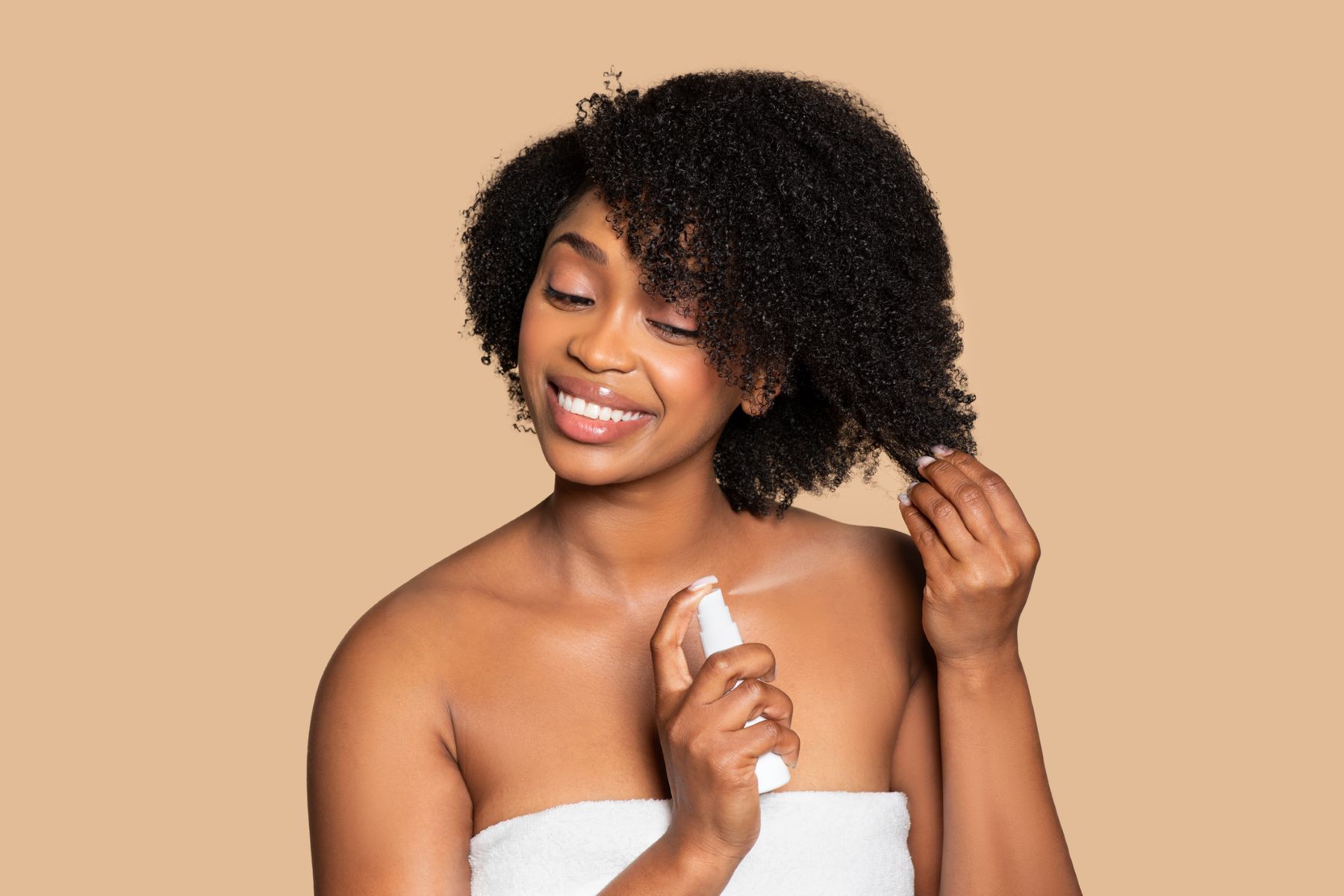 Woman caring for her type 4 hair