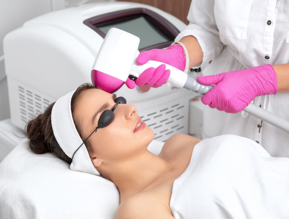 Woman having laser hairline hair removal