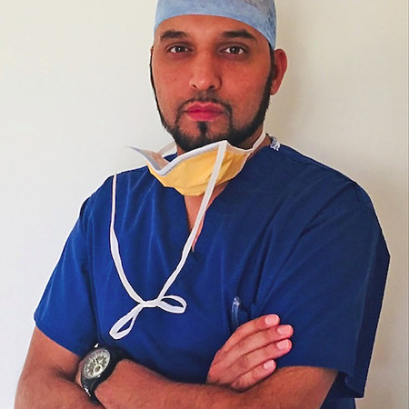 Dr. Ismail Ughratdar (FRCS)