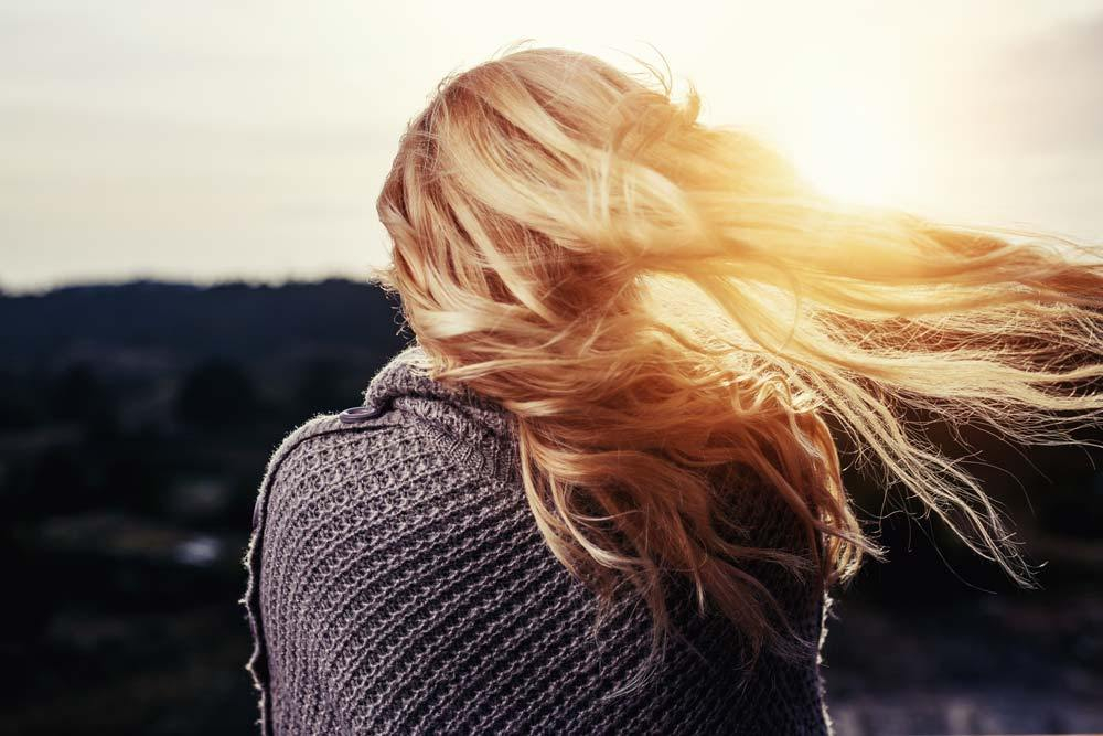 wind blowing through someone's hair