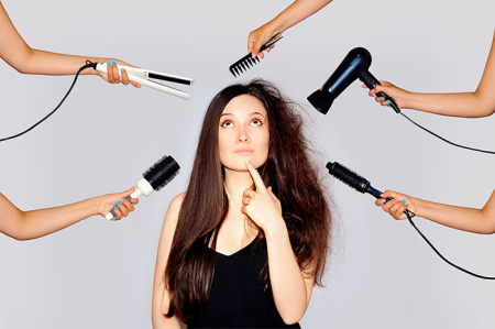 woman styling her hair